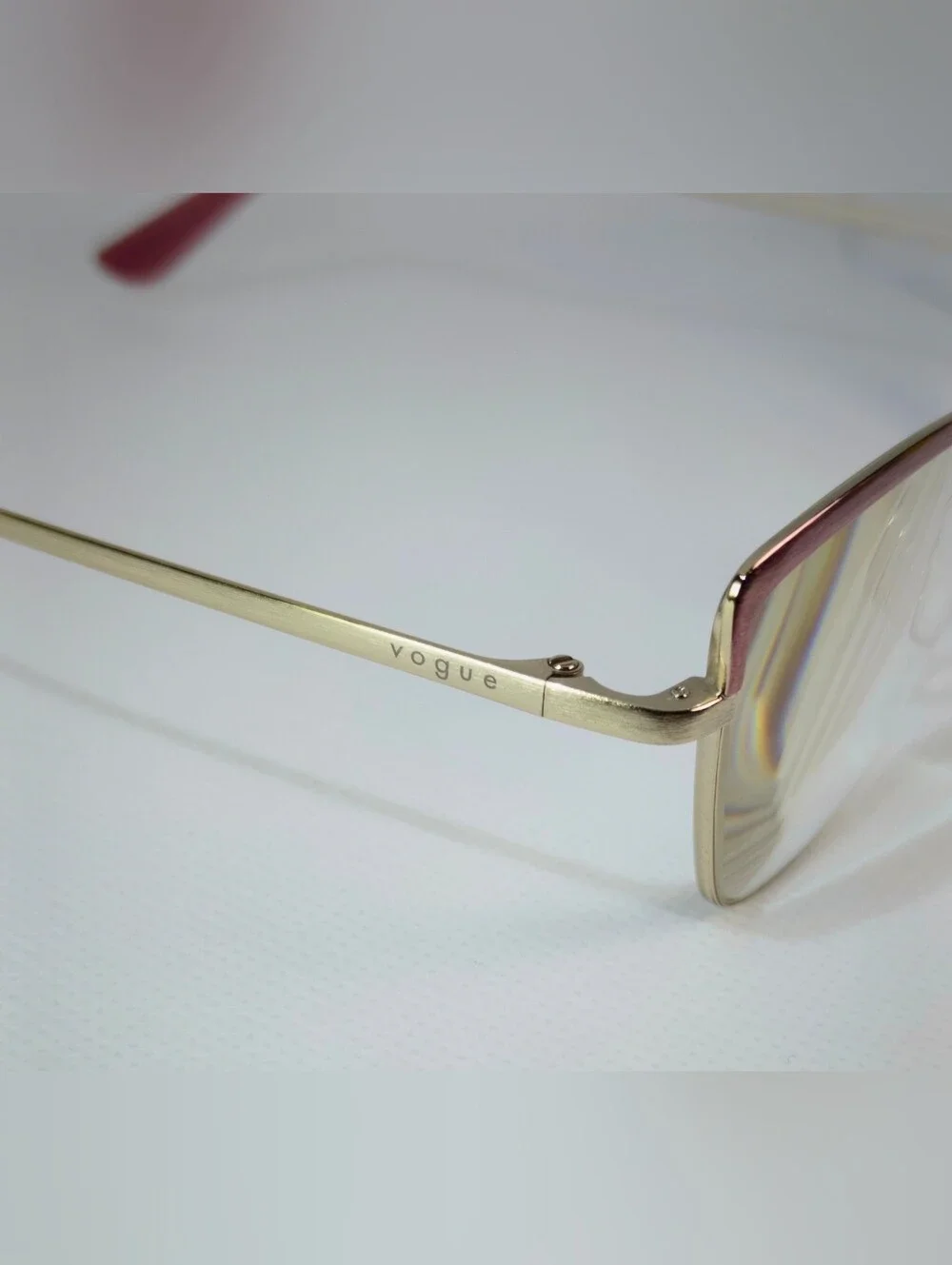 Vogue. Stylish Cat-Eye Metal Frame Glasses in Rose Gold Silk Texture.